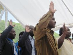 New citizens take the citizenship oath Thursday.  